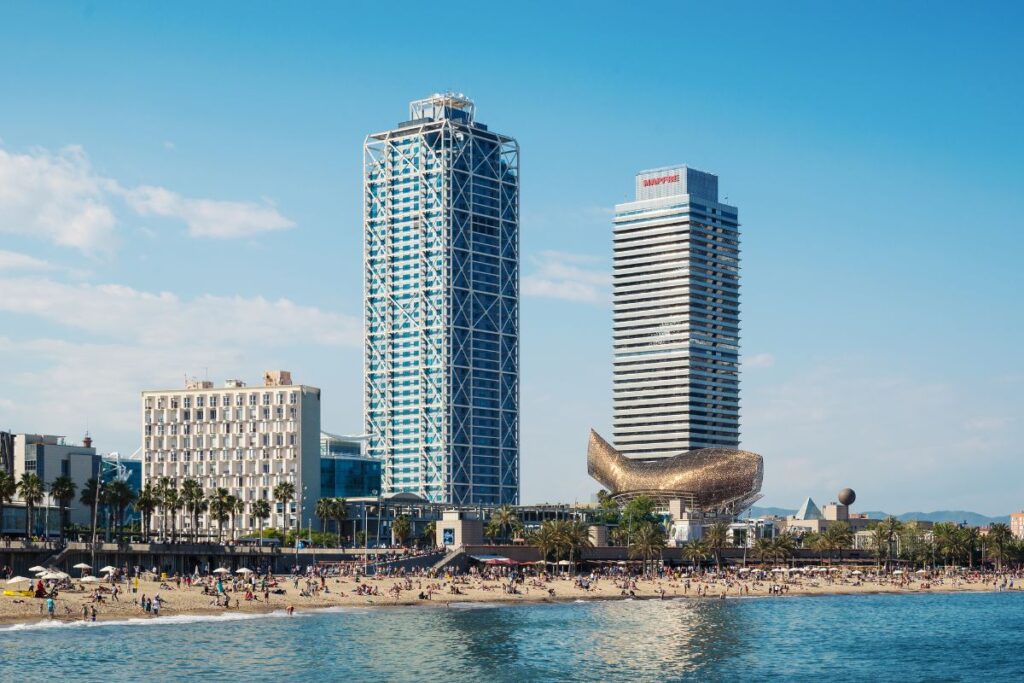 The Arts Hotel Barcelona and Mapfre Tower at Vila Olimpica views from the sea