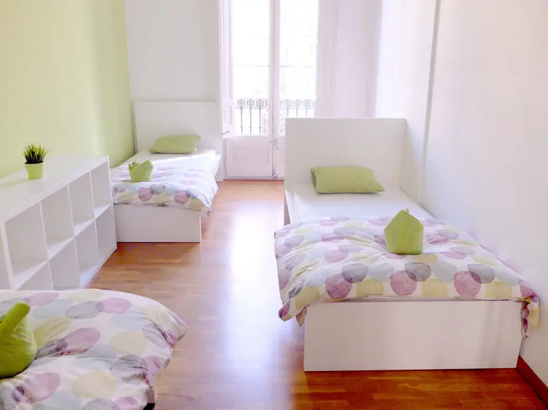 A bedroom in Fabrzzio's Petit Hostel - One of the best hostels in Barcelona