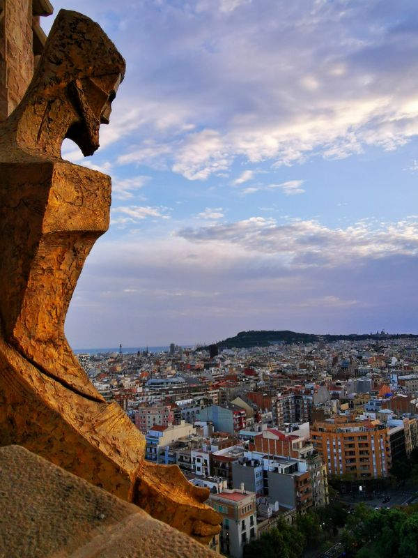 A Statue on the Passion Tower and the View from Sagrada Familia